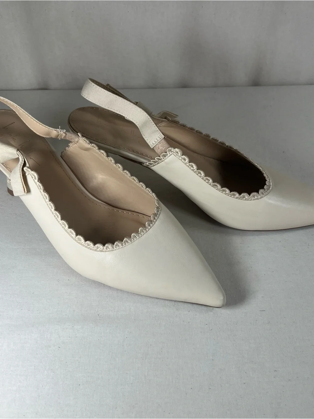Nicole Miller Cream Pointed-Toe Slingback Flats with Scallop Trim